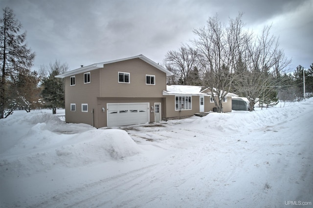 view of front of property with a garage