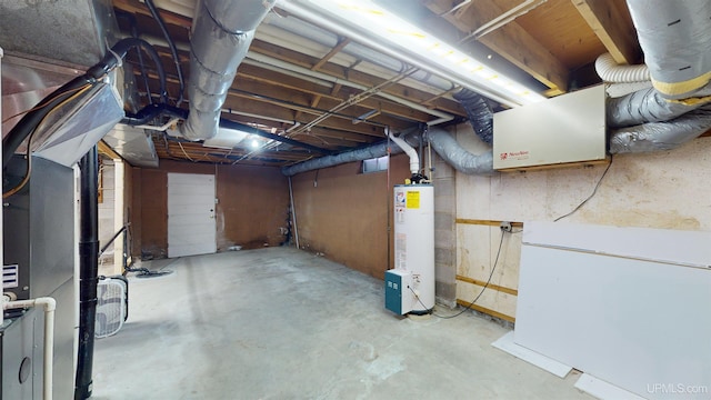 basement featuring white refrigerator and water heater