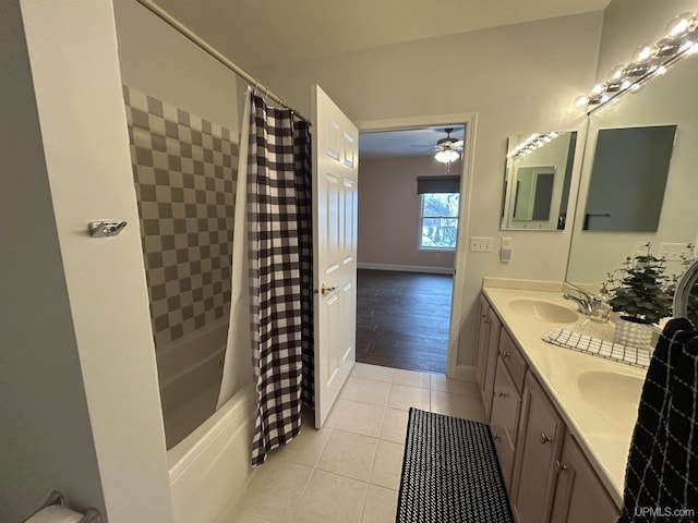 bathroom with ceiling fan, tile patterned floors, vanity, and shower / bath combo