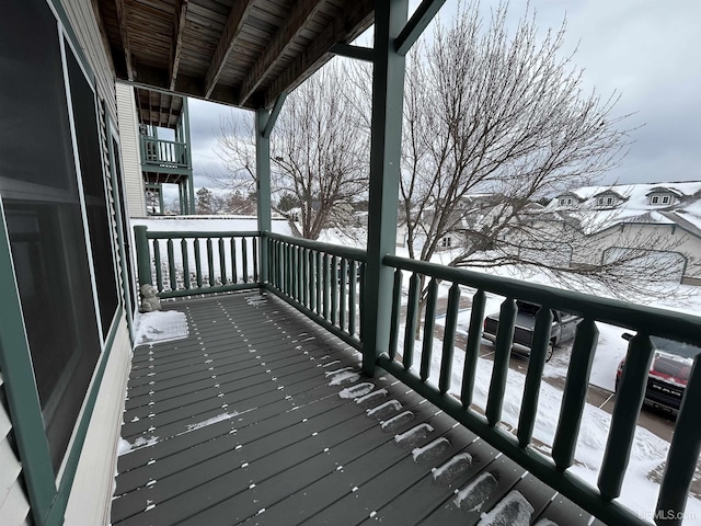 view of snow covered deck