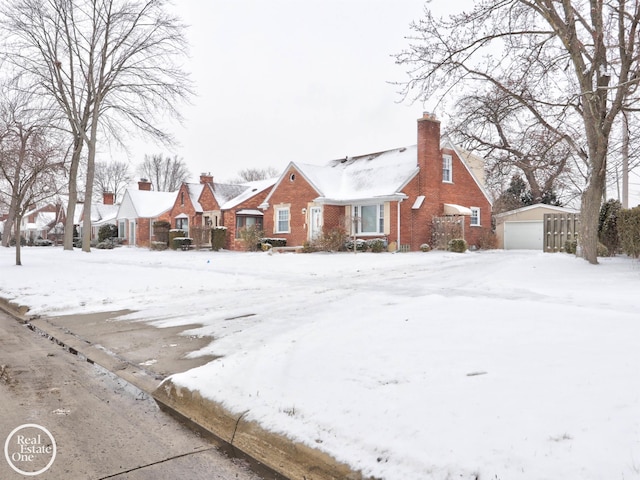 view of front of home with an outbuilding and a garage