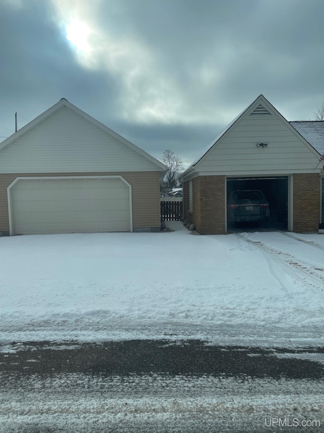 view of snow covered garage