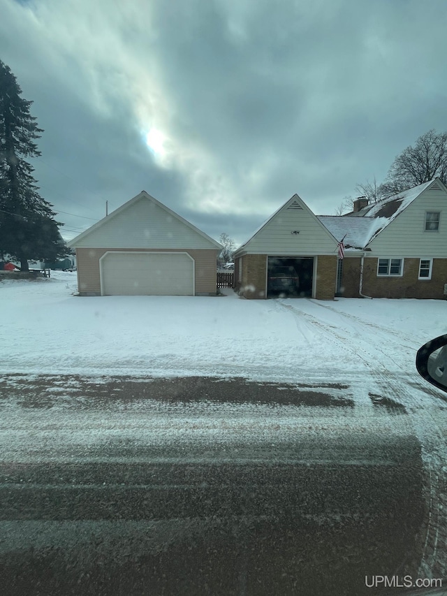 single story home featuring a garage