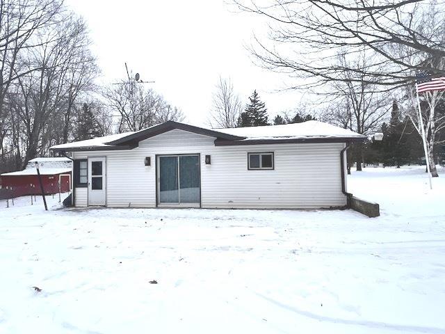 view of snow covered property