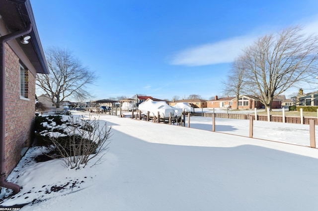 view of yard covered in snow