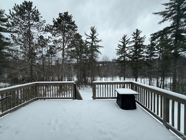 view of snow covered deck