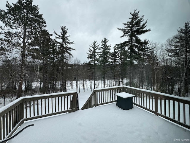 view of snow covered deck