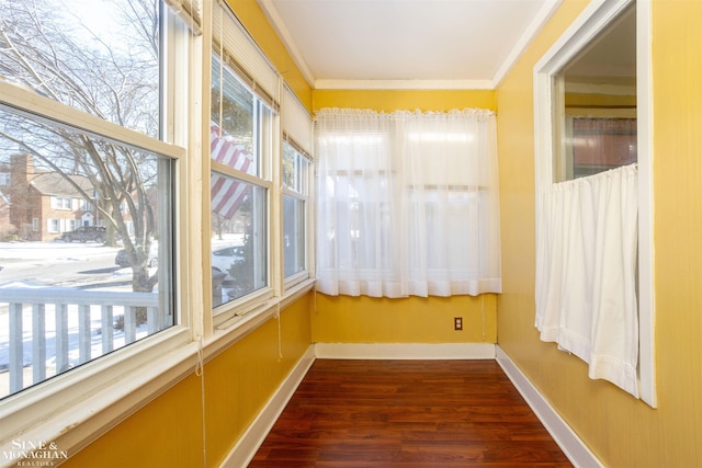 unfurnished sunroom featuring plenty of natural light