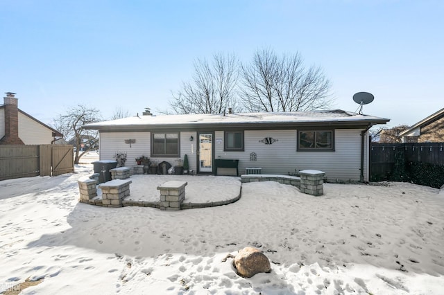 view of snow covered house