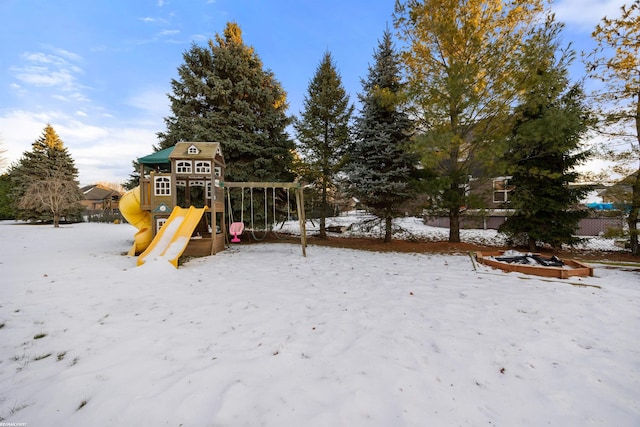 view of snow covered playground