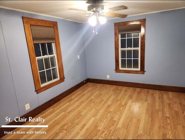 empty room featuring crown molding, ceiling fan, and light hardwood / wood-style flooring