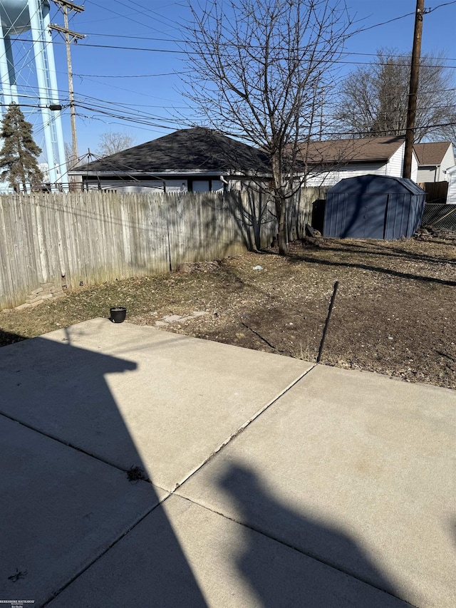 view of patio / terrace featuring fence