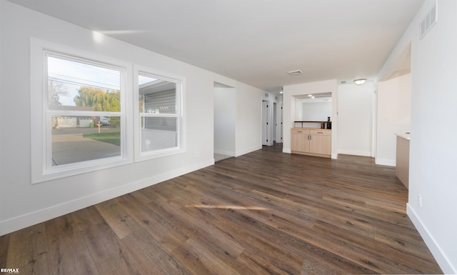 interior space with dark hardwood / wood-style floors