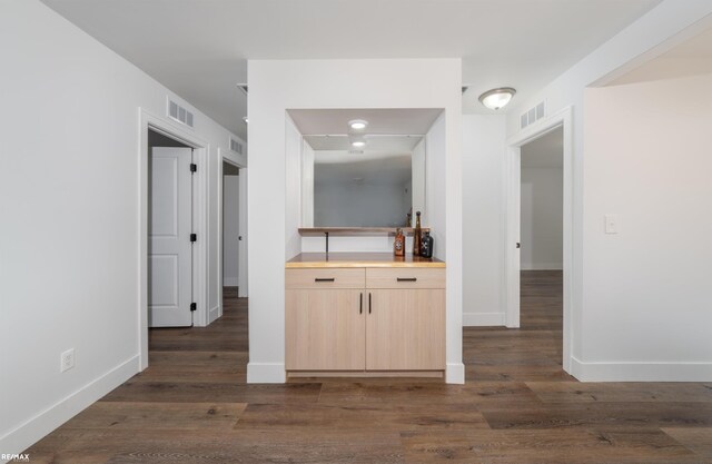 hall featuring dark hardwood / wood-style flooring