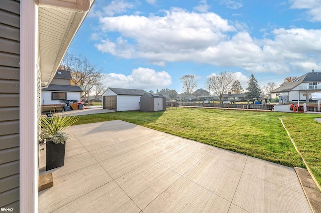 view of patio / terrace with a storage unit