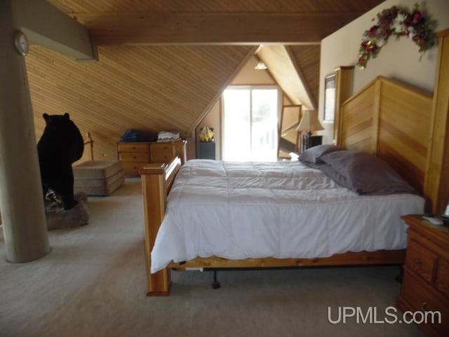 bedroom with carpet floors, wood ceiling, wooden walls, and lofted ceiling with beams