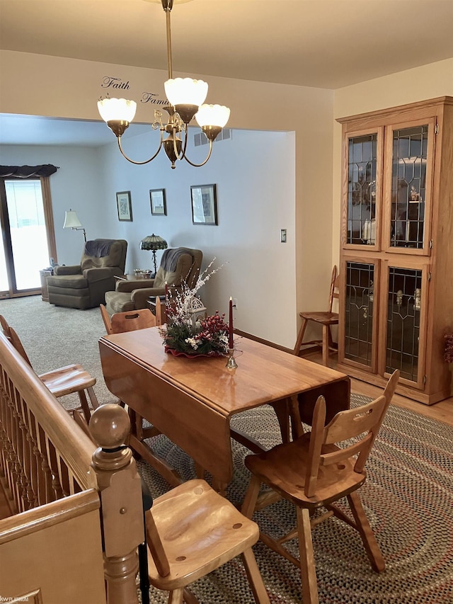 dining room featuring a notable chandelier