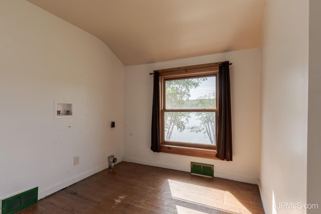 laundry area with hookup for a washing machine, hardwood / wood-style floors, and electric dryer hookup