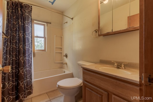 full bathroom with vanity, toilet, tile patterned flooring, and shower / bath combo