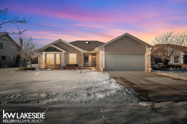 view of front of home with a garage