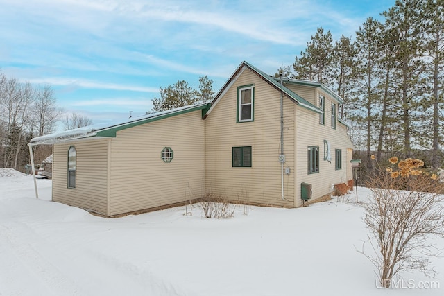 view of snow covered property