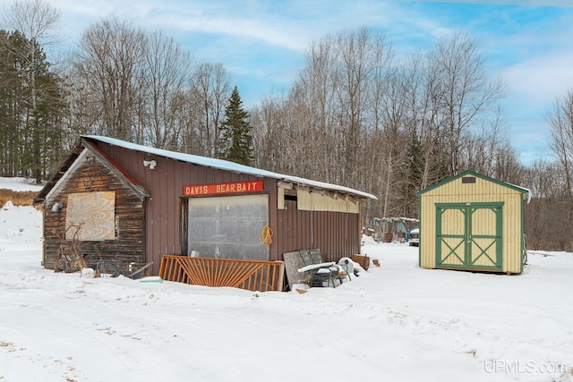 view of snow covered garage