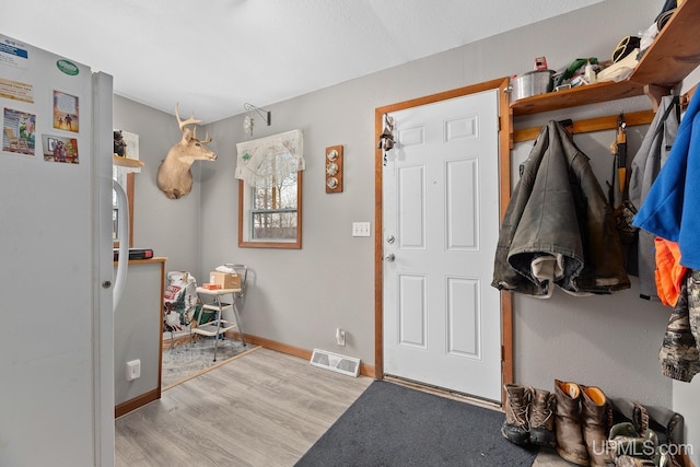 foyer featuring light hardwood / wood-style floors