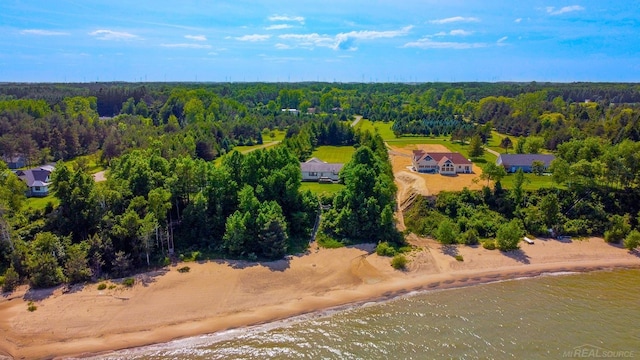 aerial view featuring a water view and a view of the beach