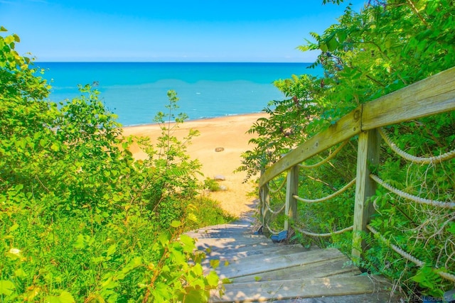 view of water feature with a beach view