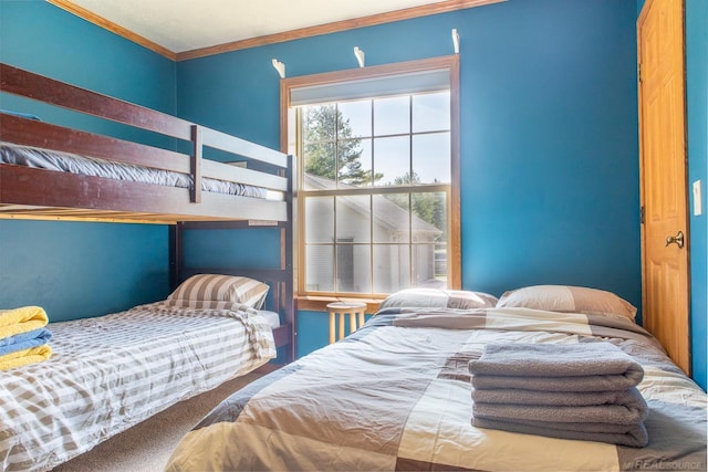 bedroom with crown molding