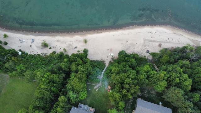 bird's eye view featuring a beach view and a water view