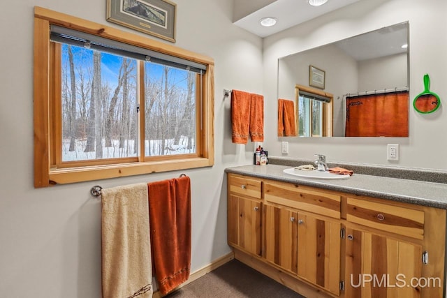 bathroom featuring vanity and walk in shower