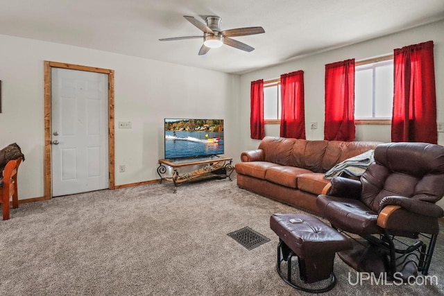 living room featuring ceiling fan and carpet flooring