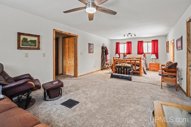 carpeted bedroom featuring ceiling fan