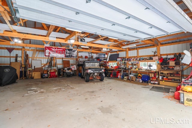 garage with a workshop area