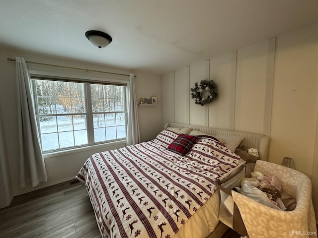 bedroom featuring dark hardwood / wood-style flooring