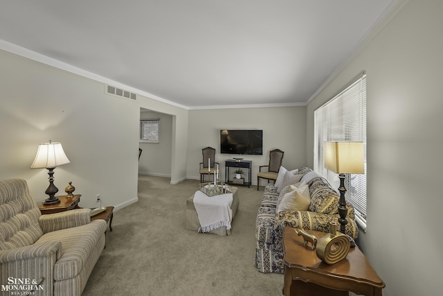 carpeted living room with crown molding