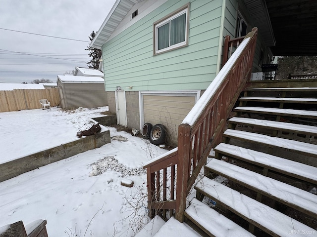 view of snow covered property