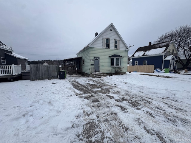 view of snow covered house