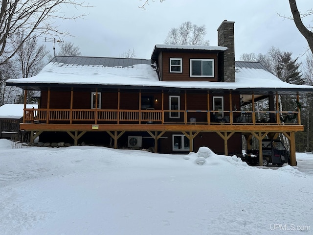 view of snow covered property