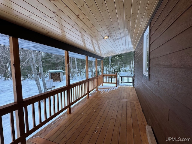 view of snow covered deck