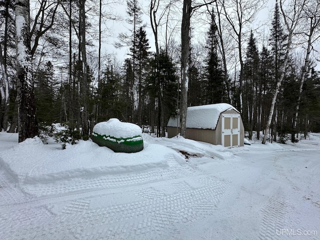 view of yard layered in snow