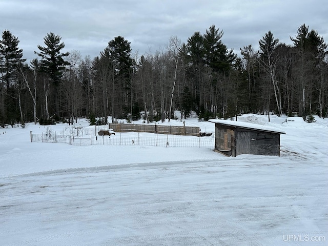 view of yard covered in snow