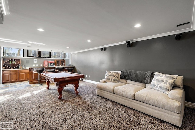 rec room featuring carpet flooring, crown molding, pool table, and indoor bar