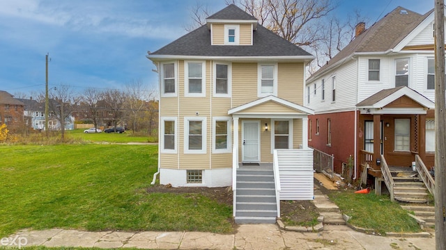 view of front facade with a front yard