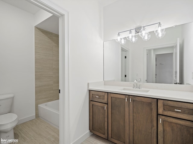 full bathroom with vanity, toilet, and tiled shower / bath combo