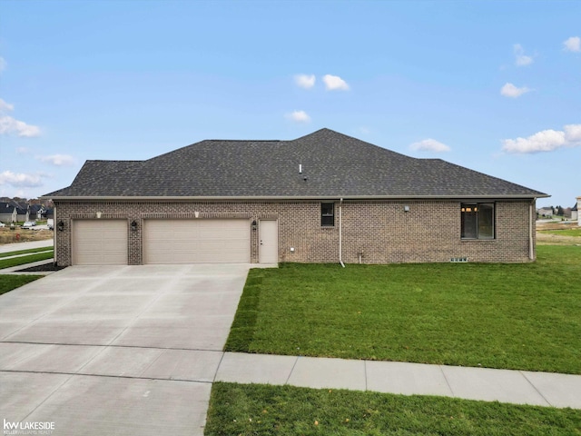 exterior space featuring a yard and a garage