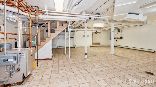 basement featuring baseboard heating