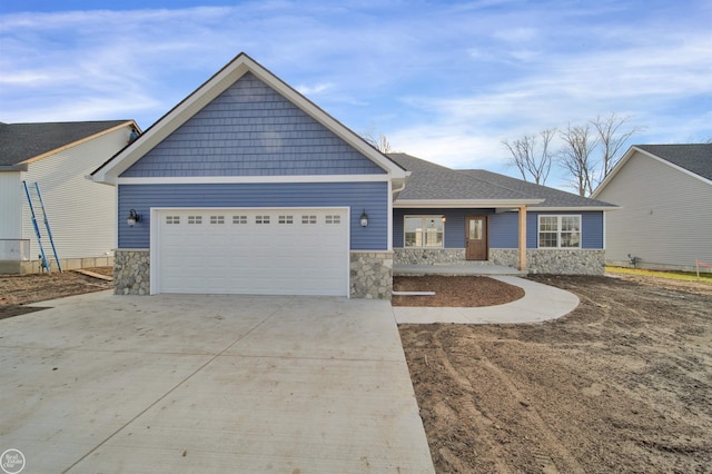 1834 Riley Rd, Saint Clair, MI 48079 - view of front of home featuring a garage and a porch