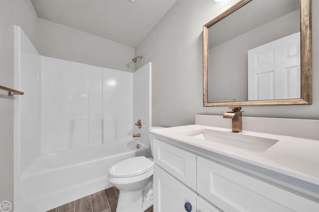 1834 Riley Rd, Saint Clair, MI 48079 - full bathroom with hardwood / wood-style flooring, vanity, bathtub / shower combination, and toilet